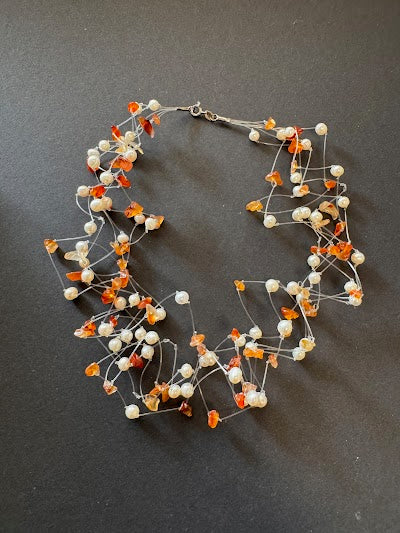 Multi-stranded 'floating' white pearl and carnelian gemstone necklace