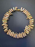 Golden-hued stick pearl necklace