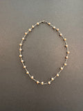 Soft-pink-hued pearl twisted strand necklace