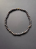 Peacock-hued freshwater pearl necklace with a 9ct gold clasp