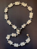 White stick pearl lariat necklace with a fine pewter sphere