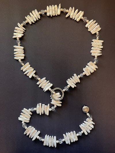 White stick pearl lariat necklace with gunmetal drop