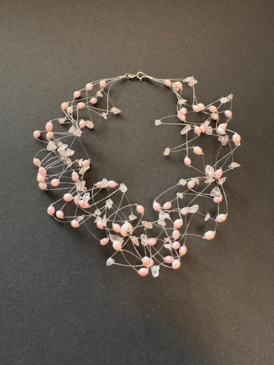 Multi-stranded 'floating' pink pearl necklace