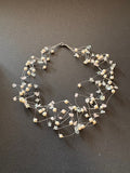 Multi-stranded 'floating' white pearl and gemstone necklace