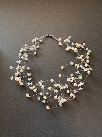 Multi-stranded 'floating' white pearl and gemstone necklace