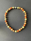 Bronze, golden, copper and pale green (11-12mm) shell pearl necklace