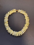Pale lime green-hued stick pearl necklace