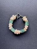 Cream pearl and green glass bead bracelet
