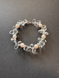 Creamy-white-hued pearl and clear quartz bracelet