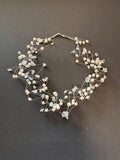 Multi-stranded 'floating' white pearl necklace
