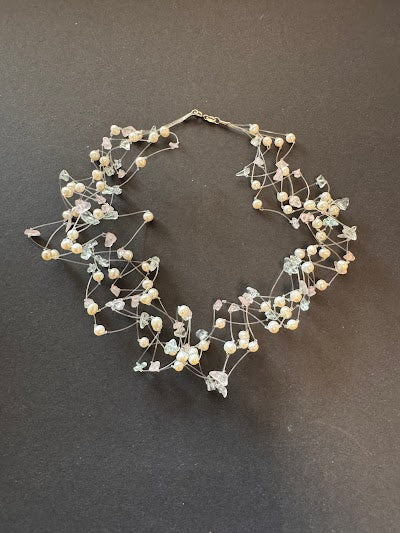 Multi-stranded 'floating' white pearl necklace