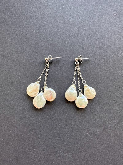 White baroque pearl earrings on a sterling silver post