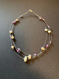 Multi-stranded pearl and stone 'floating' necklace