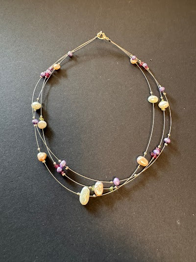 Multi-stranded pearl and stone necklace