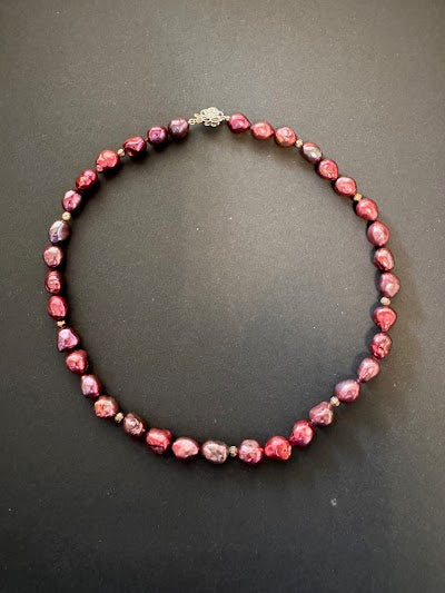 Pink-purple-hued pearl necklace