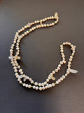 Continuous-strand pale pink freshwater pearl and quartz nugget necklace