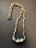 Three large silvery-grey-hued baroque pearl and bead necklace