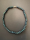 Blue-green-hued pearl necklace