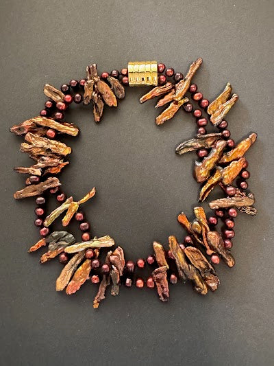 Double-stranded bronze-hued stick pearl necklace