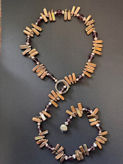 Bronze-hued stick and round pearl lariat necklace