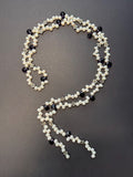 White pearl and deep purple teardrop lariat necklace