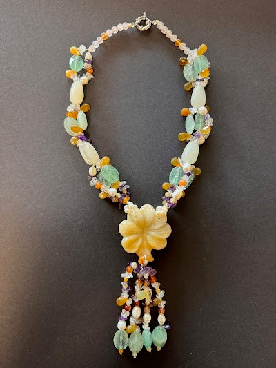 Y-shaped pearl and buttery-yellow-hued carved flower necklace