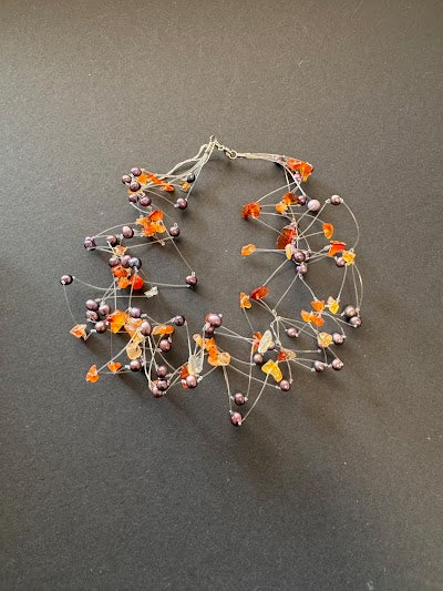 Multi-stranded 'floating' peacock-hued pearl and quartz necklace