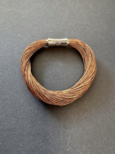 Bronze-hued metallic thread bracelet