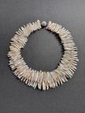Double-stranded white stick pearl necklace with a diamante magnetic clasp