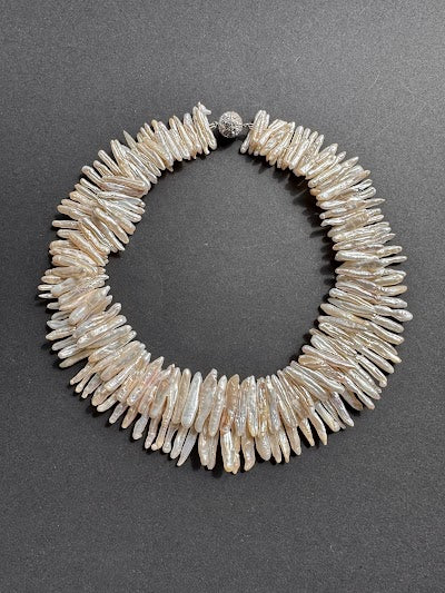 Double-stranded white stick pearl necklace with a diamante magnetic clasp