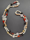 Continuous-strand pearl necklace with quartz, carnelian, onyx and agate beads
