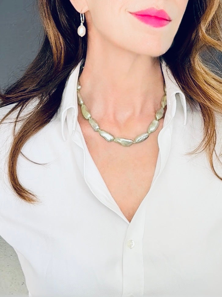Pale olive green-hued elongated pearl necklace with box clasp