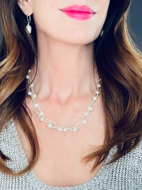 Multi-stranded white pearl and bead necklace