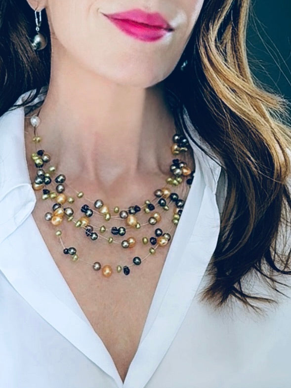 Multi-stranded orange pearl necklace