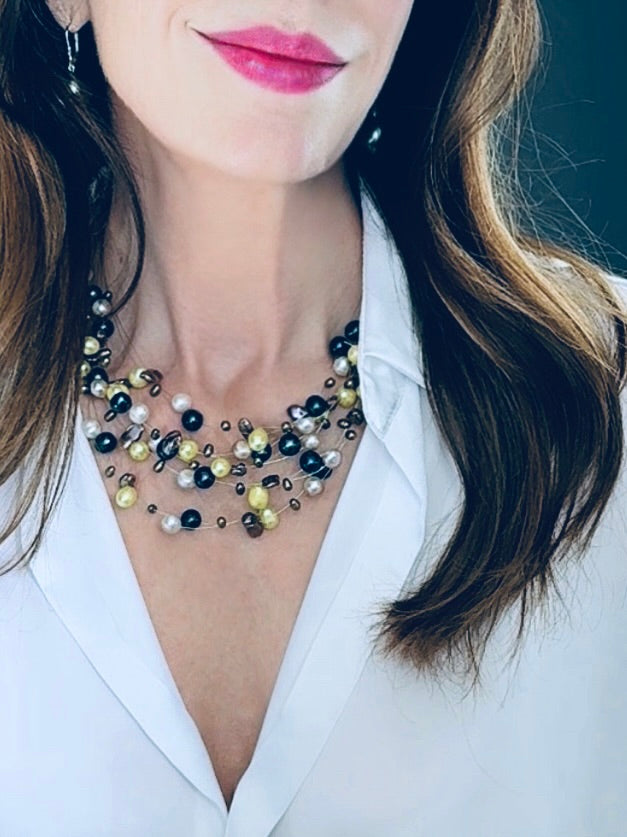 Multi-stranded yellow pearl necklace