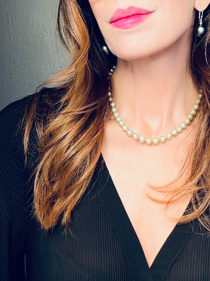 Pale olive green-hued pearl necklace