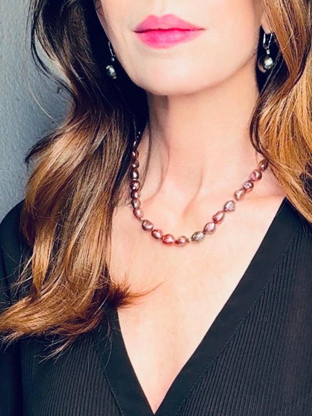Pink-purple-hued pearl necklace