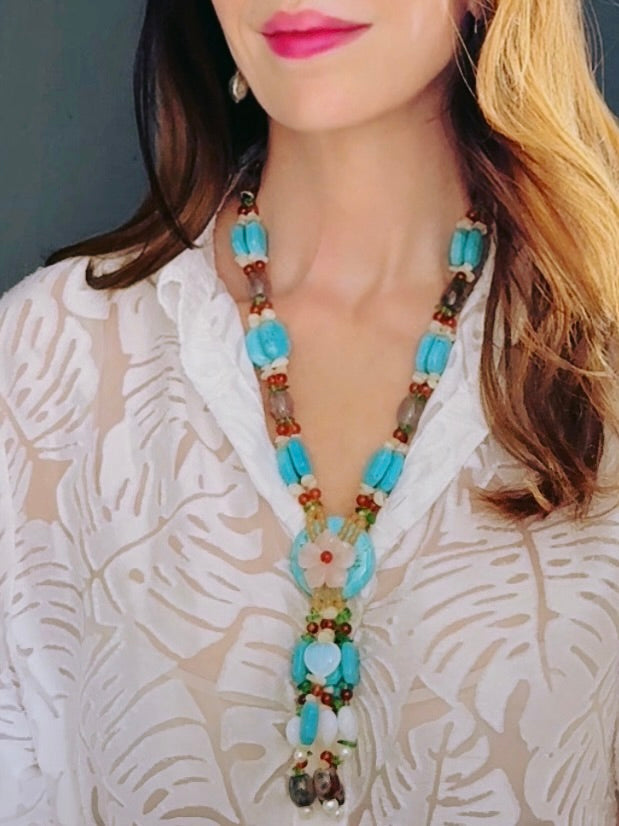 Turquoise y-shaped necklace with a carved rose quartz flower