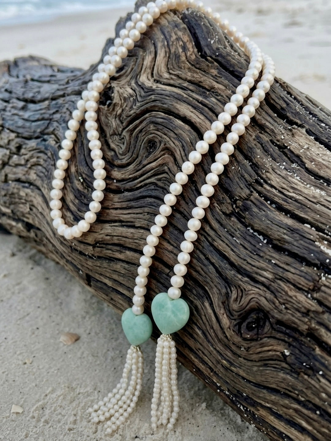 White pearl and heart-shaped jade lariat necklace